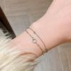 Zhongying Jewelry: Women's Japanese & Korean Style Double-Layer Interlocking Bracelet - Niche Design, High-End Feel, Perfect for Stacking.