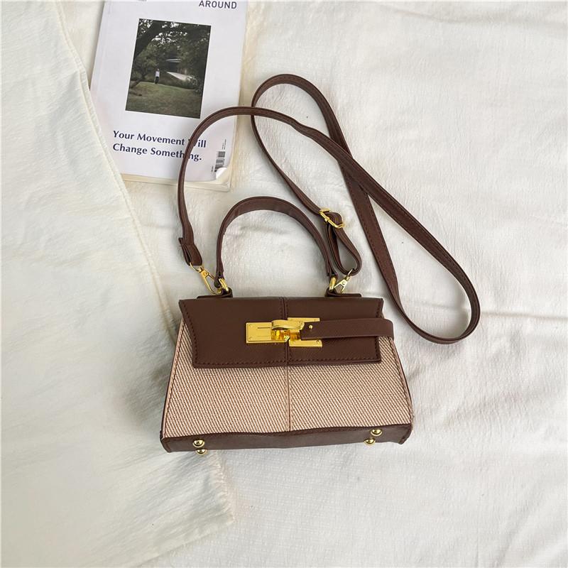 Keystone bag portable fashion exquisite color contrast splicing small square bag simple shoulder messenger bag women's bag