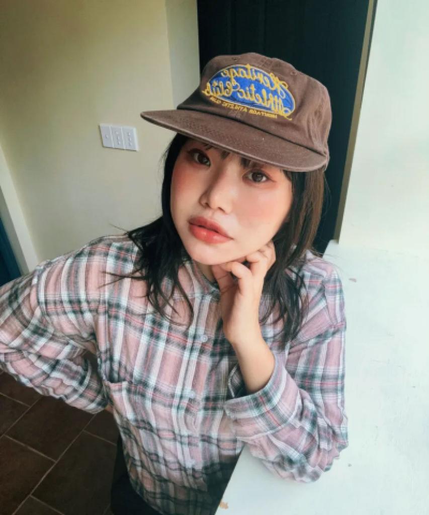 Yunibeoseugameonteu Universe Sign Long Bill Washed Cap_Brown
