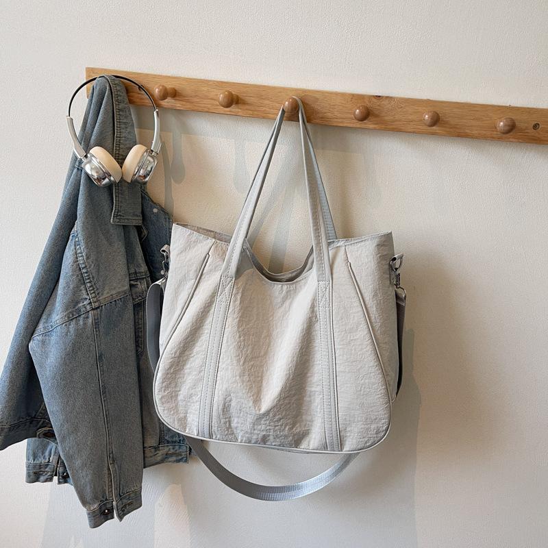 

Сумка-мешок женская новая легкий класс для поездок на работу большая вместимость на плечо сумка-мессенджер серый