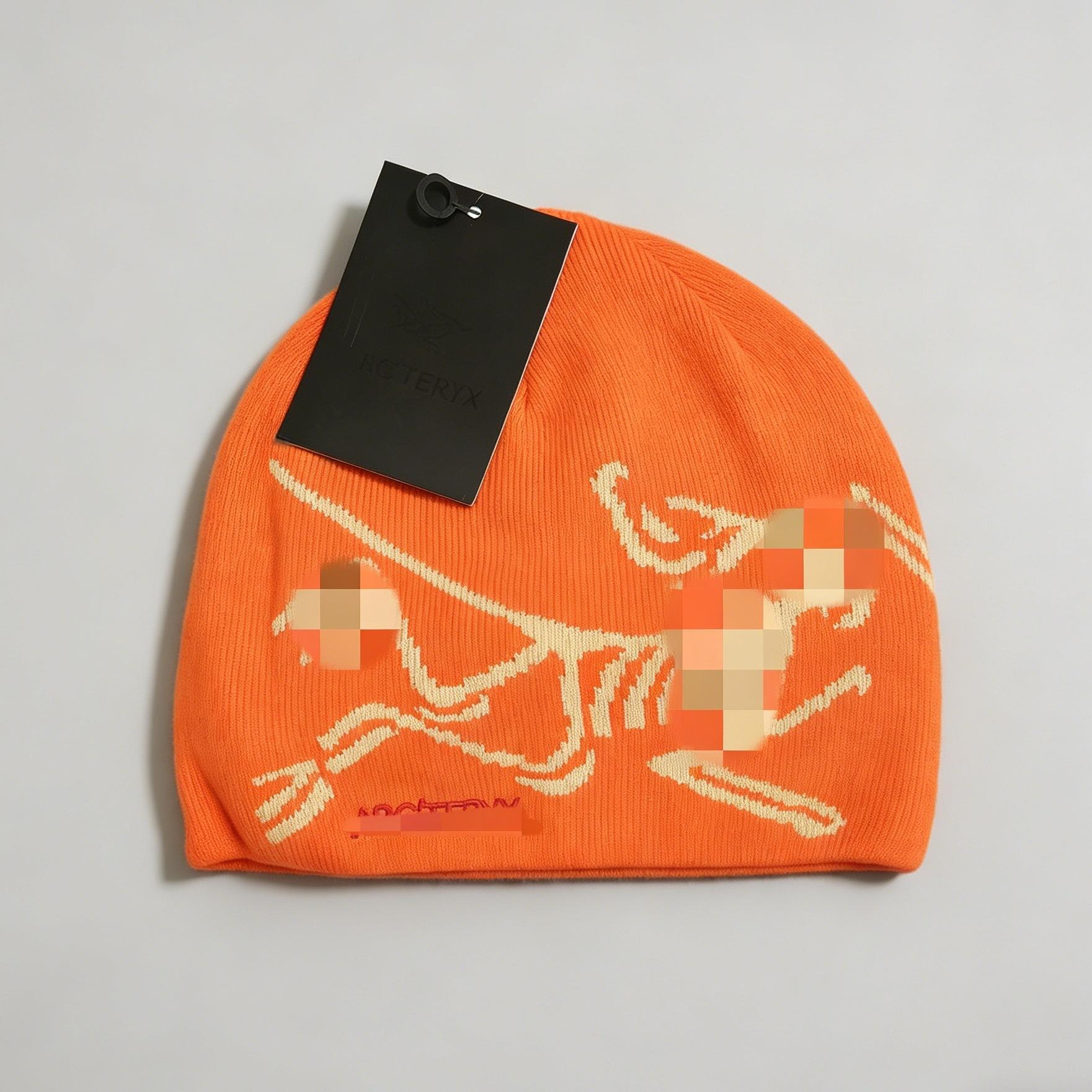 Moda jesienno-zimowa wszechstronna wełniana czapka z literą europejska i amerykańska casualowa czapka na zimę czapka dzianinowa Orange red black