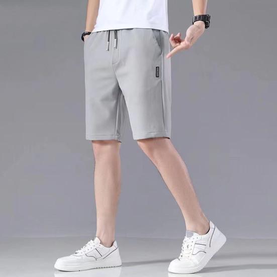 Herren Sommer Shorts Elastischer Kordelzug Taille Gerade Shorts mit weitem Bein Taschen Design Eisseide Einfarbig Sport Shorts