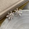 Niche Versatile Light Luxury Personalized Dripping Oil Five-Petal Flower Three-Dimensional Flower Exaggerated Metal Feeling Three Pearl Earrings