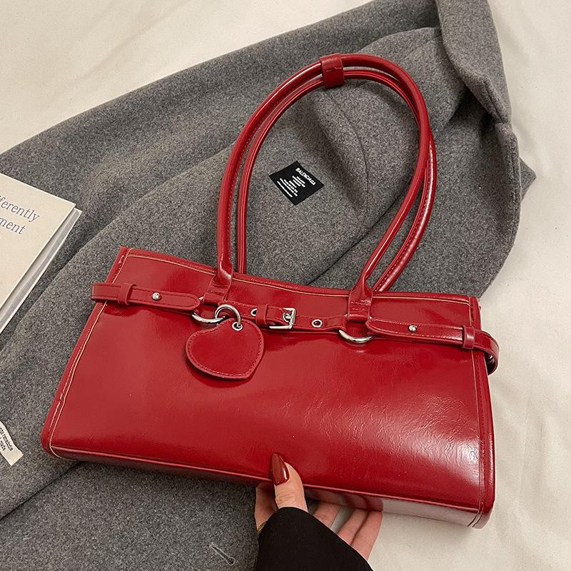 Frühling Neuprodukt Nischendesign personalisierte Ölwachsleder Achsel-Baguettetasche vielseitig Pendeln Temperament tragbare Umhängetasche Damen