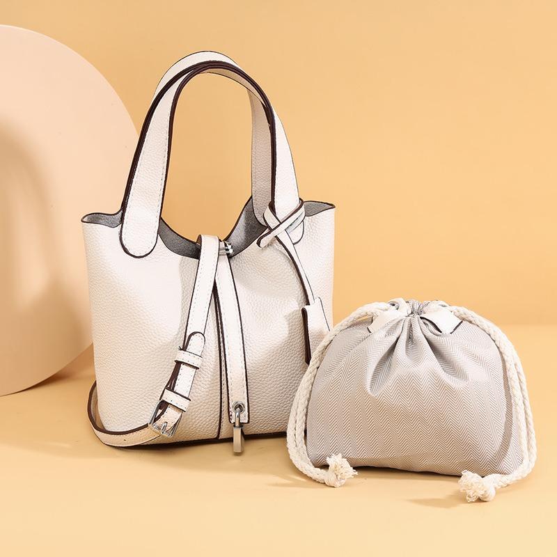 The top layer of cowhide women's bag, high-end leather bucket bag, handbag bag, commuter lychee pattern one-shoulder crossbody mom bag