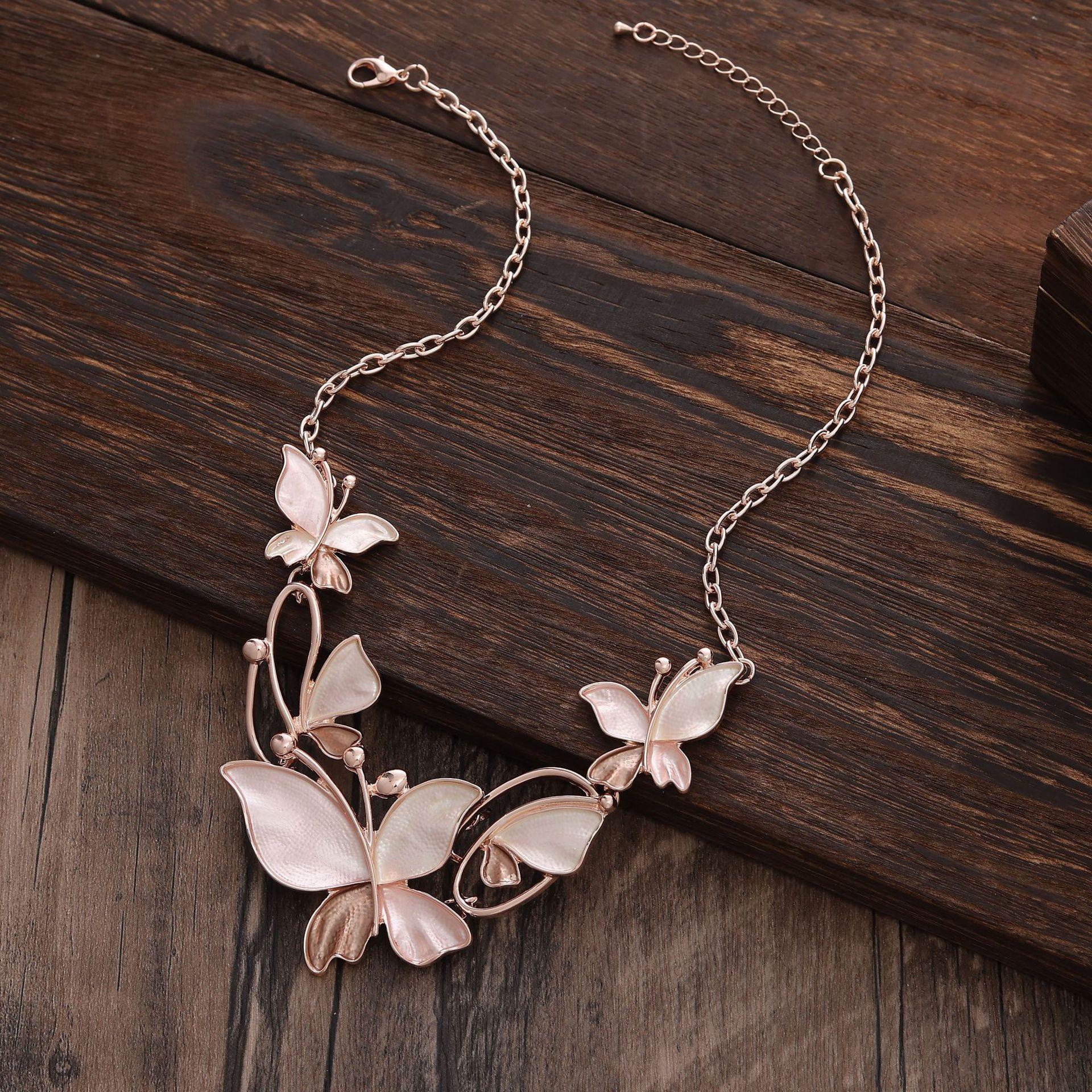 Новое цветное масло, ожерелье с бабочкой, геометрическая полая бабочка, летающее женское высококлассное универсальное ожерелье