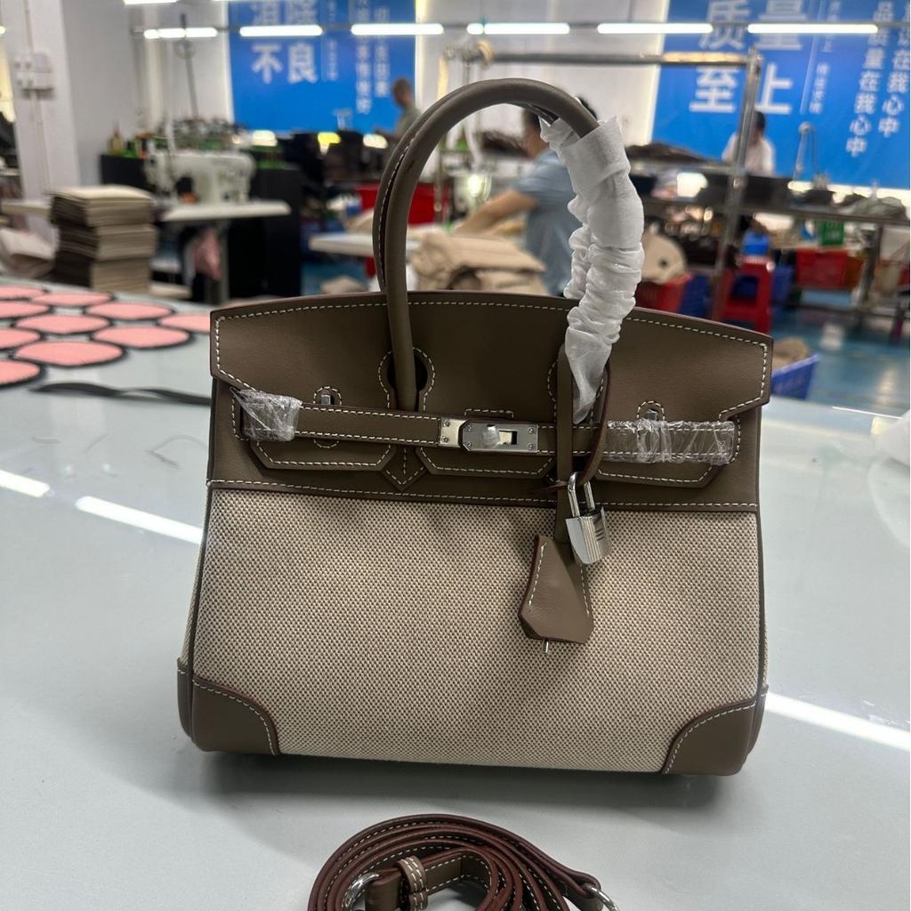 Grensoverschrijdende middeleeuwse 25cm30cm koeienhuid canvas damestas met lange schouderband forens casual leren schouder