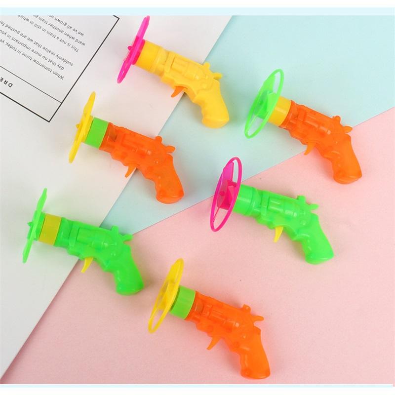 Drehmoment-Kreisel, kreativer Kinder-Pistolen-Kreisel startet rotierende kleine Kreisel, rotierende fliegende Untertasse Kreisel Kinderspielzeug