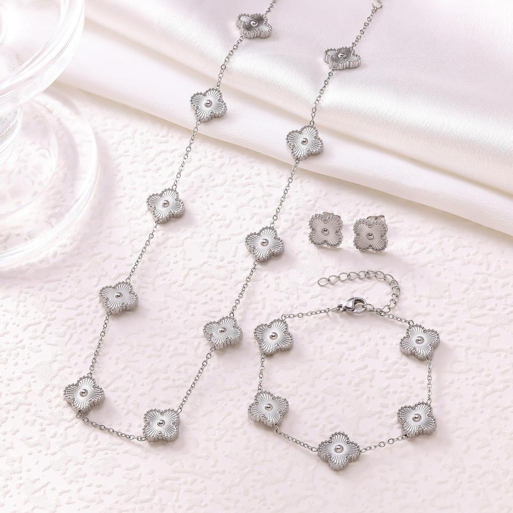 Elegant Four-Leaf Clover Jewelry Set: Titanium Steel Necklace, Earrings, and Bracelet - Light Luxury Design