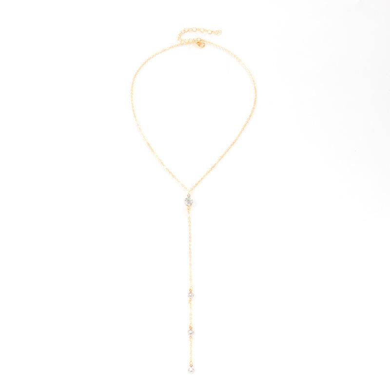 

Колье с кисточкой из циркона: Элегантный чокер-цепочка на ключицу в виде капли воды. золотой