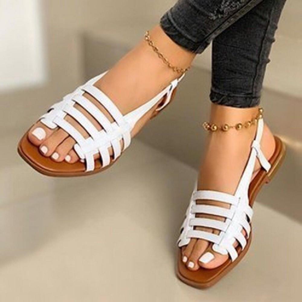 Sandals women's Korean version flat-soled single shoes spring and summer fashion woven beach shoes