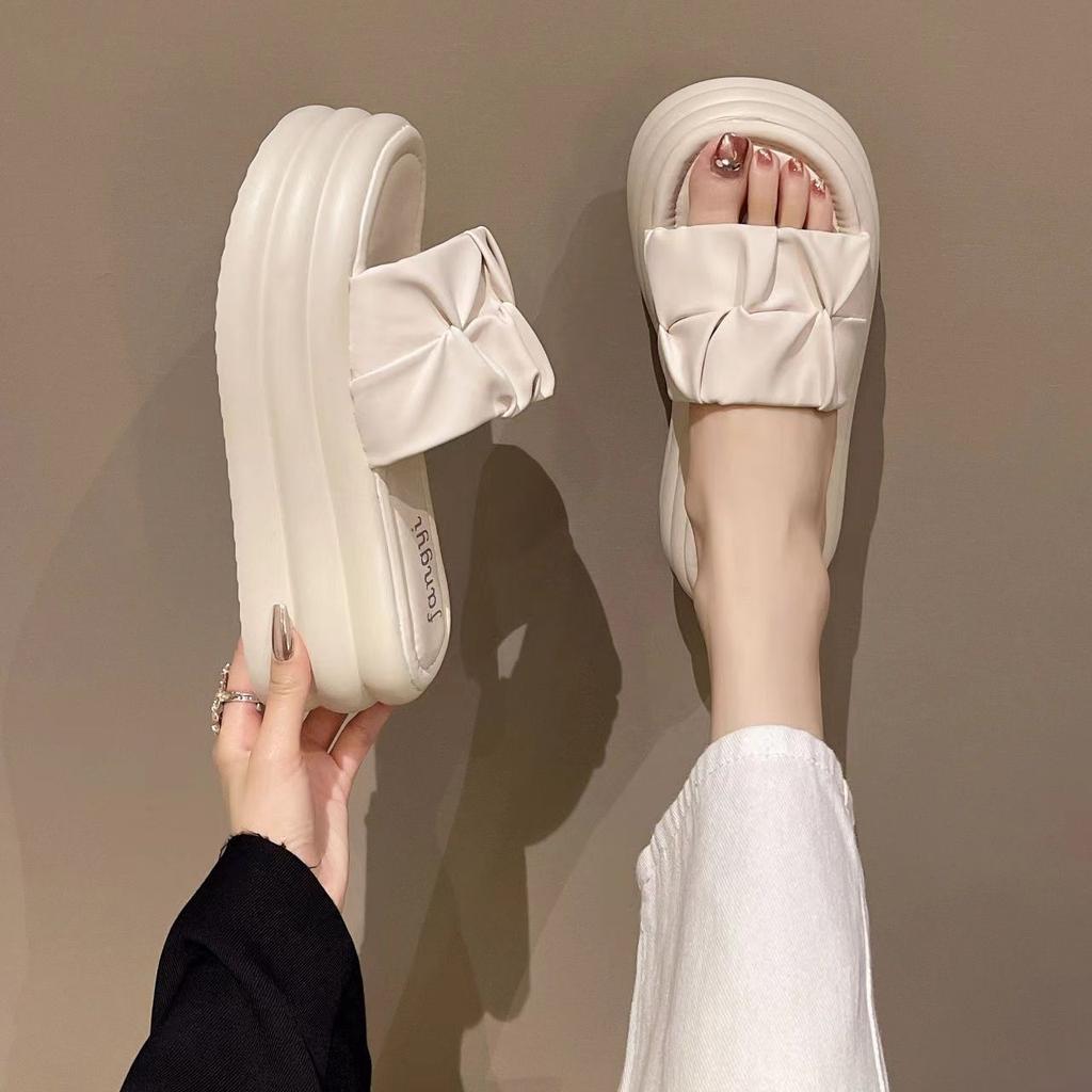 One-word drag women's high-end sense of explosion outside 2024 summer new stepping on shit muffin fashion heightening thick-soled slippers