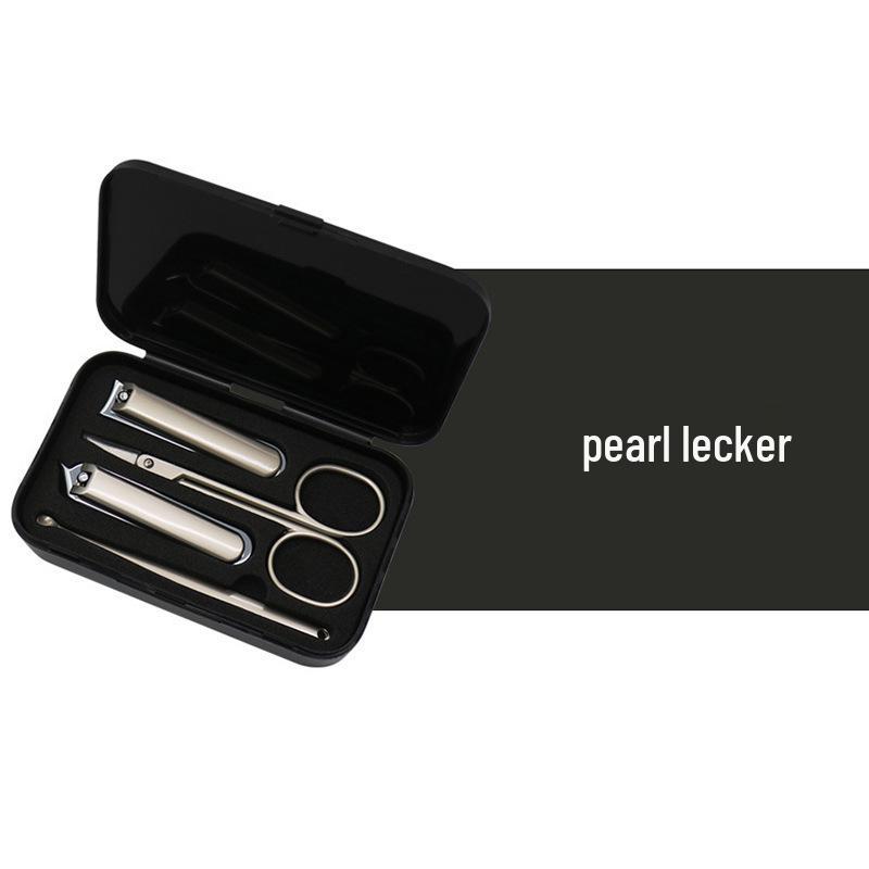 4-Piece Portable Grooming Kit: Nail Clippers, Scissors, Tweezers, Ear Spoon
