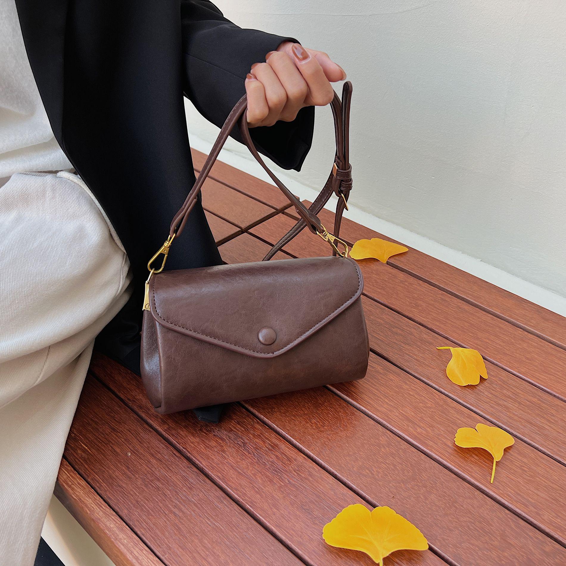 

2025 Versatile Women s Soft Leather Shoulder & Crossbody Accordion Bag - Casual, Simple, & Elegant