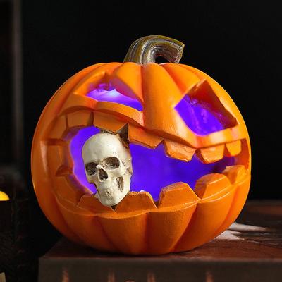 Halloweenská figurka lebky jedající dýně se světly Strašidelně rozsvícená socha z pryskyřice dýňové hlavy