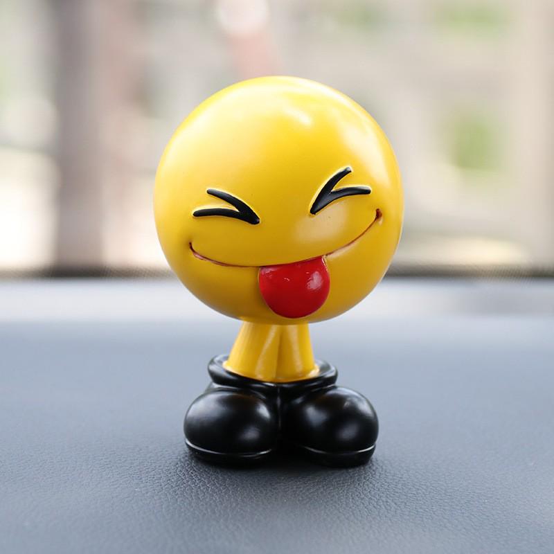 Ha Hu Emoji Bobblehead Car Ornament: Cute Cartoon Interior Decoration.