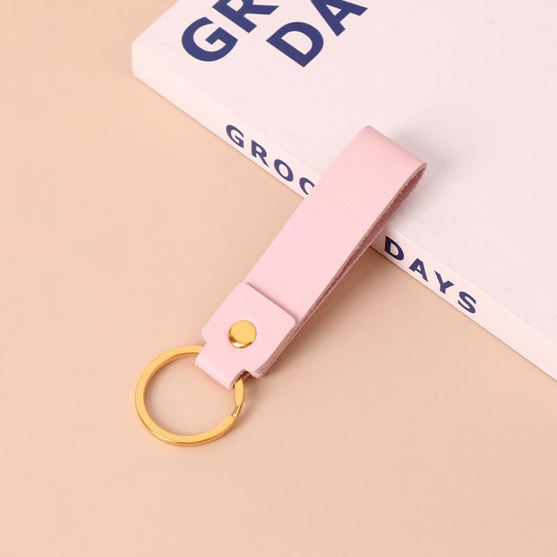 Creative Minimalist PU Leather Keychain: Solid Color Car Anti-Lost Pendant and Bag Accessory