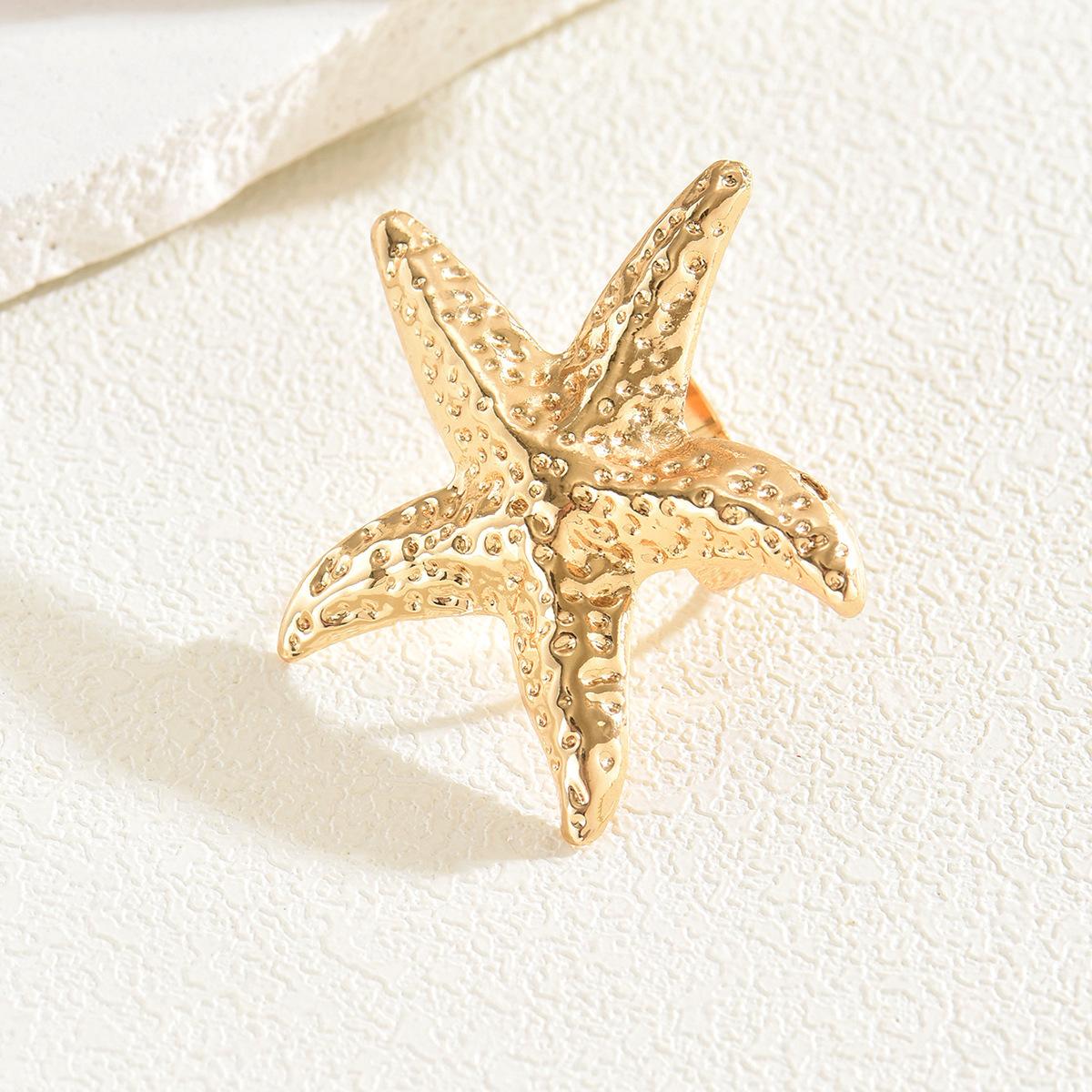 

Gold-plated open ring European and American jewelry jewelry seaside conch starfish design exaggerated ring woman