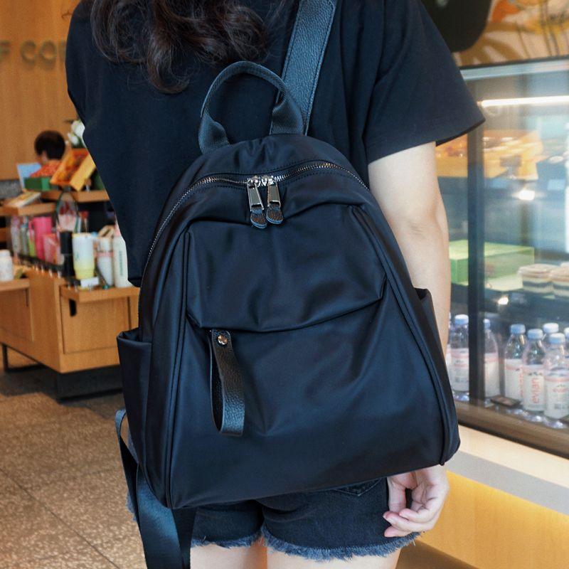 

Рюкзак большой вместимости из ткани Оксфорд для женщин 2025 Новое поступление Легкая дорожная сумка Модный женский Легко сочетаемый рюкзак Дорожная сумка Black