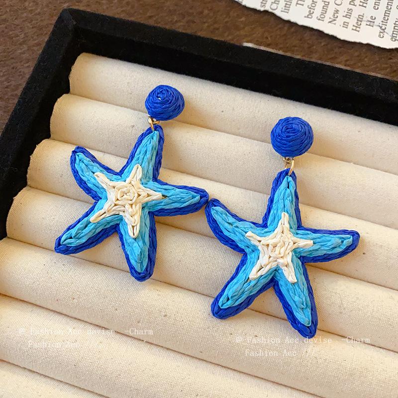 Steel needle spring small fresh woven five-pointed star earrings fashion design earrings seaside vacation style earrings