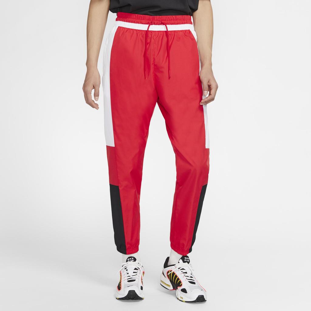 Nike Pantalon tissé à revers à blocs de couleurs pour hommes, bas rouge CK4396-657