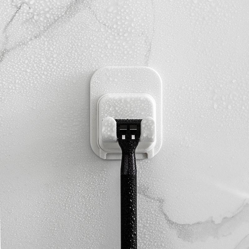 Wandaufbewahrungshaken Steckdosenhalter Stanzfreier Wandhaken Kleiderbügel Rasiererhalter Ständer Kleiderbügel Türhaken Schlüsselhalter