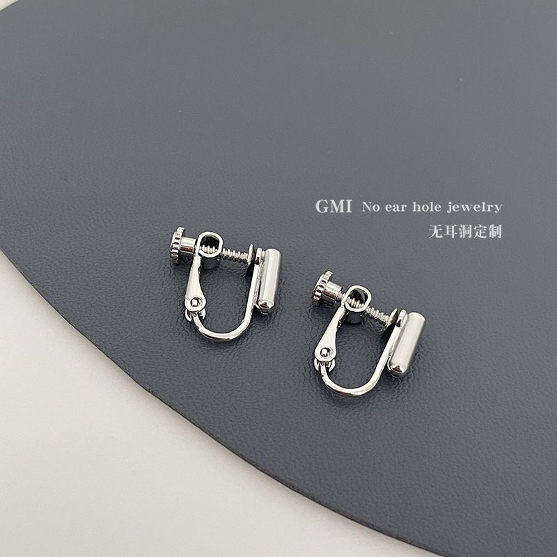 

Универсальный конвертер 14К Безболезненная женская клипса для ушей Pair of silver spiral ear clips