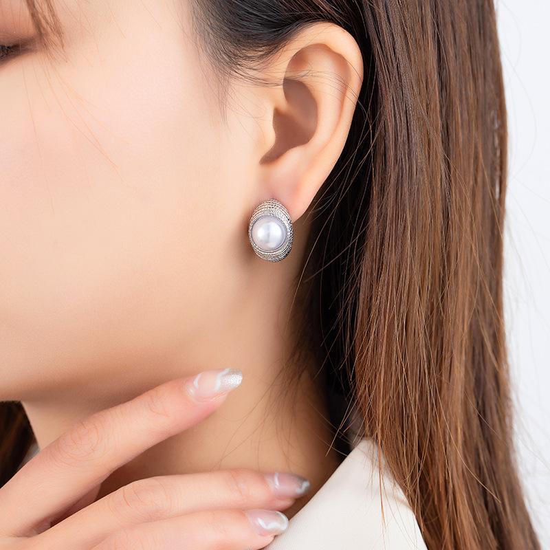CARLIDANA Fashion Vintage French Style Unique Design Gold Plated Stainless Steel White Pearl Earrings for Women Stud Earrings