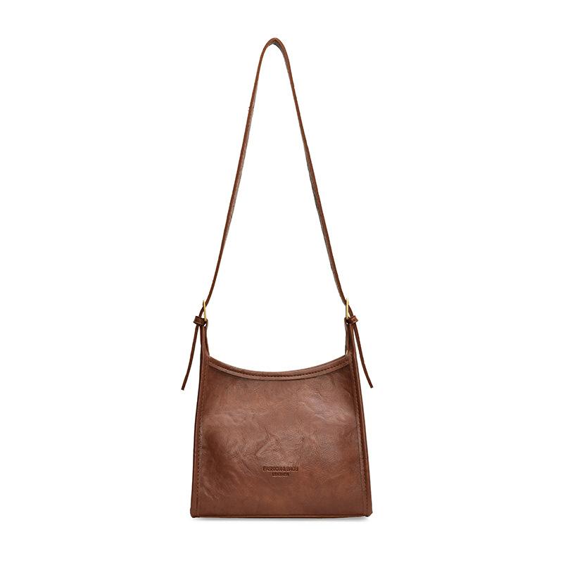 

Популярна в цьому році портативна невелика жіноча сумка осінь 2024 нова проста іноземна сумка під пахвами модна універсальна сумка через плече коричневий