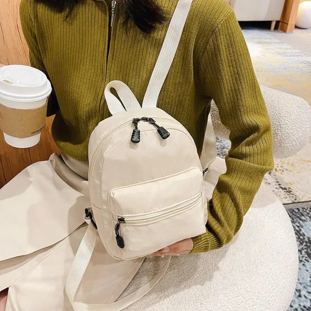 Mini Women's Backpack Trends: Nyl Women's Bags, Small Schoolbags, and White Canvas Backpacks Are Fashiable and Casual Pick