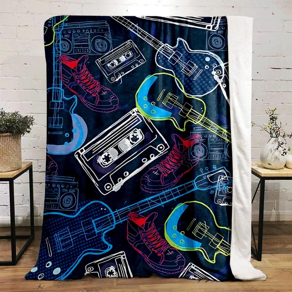 Guitars, cassettes, sneakers, and boomboxes in a colorful retro style. for all seasons blanket lunch break throw gift