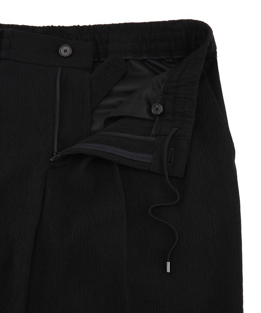 Jilseutyueoteunyuyogmaen Relaxed Double-Pleat Tapered Pants - Black (Jnpa6B522Bk)
