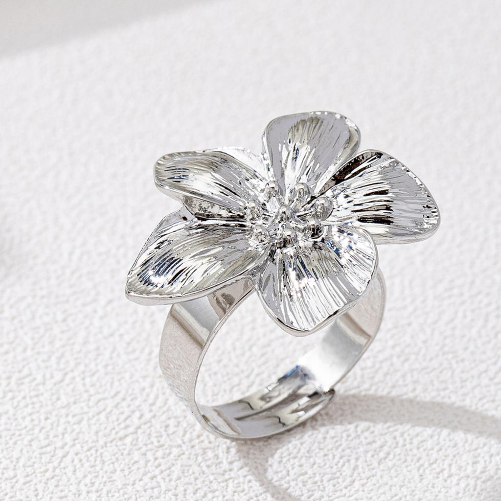 A Women's Ring with a Flower Design, Made of Metal and Adjustable In Size, Suitable for Everyday Wear and Holidays
