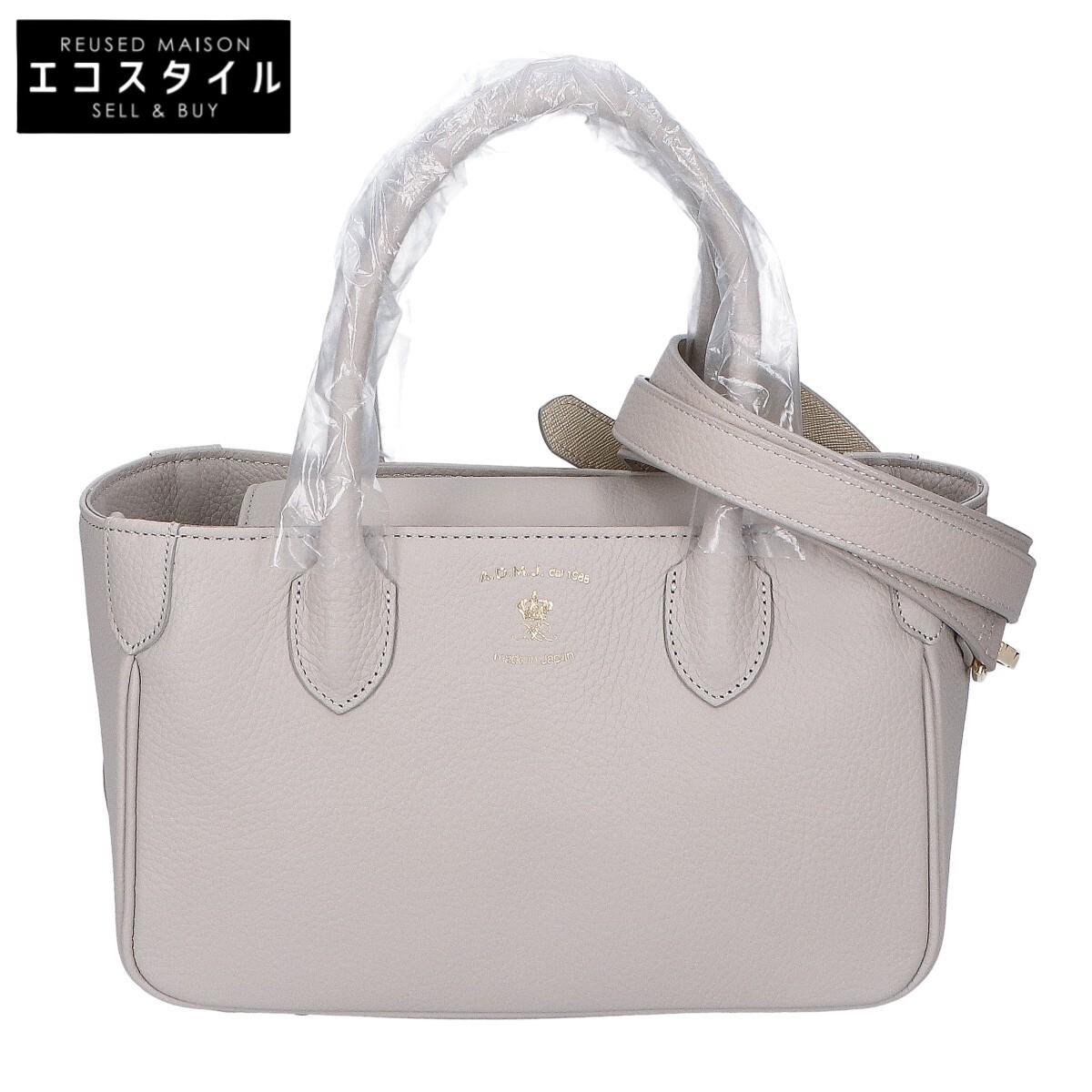 

A.D.M.J. Accessoires De Mademoiselle [Brand new, unused] ACS01186A Shrink leather mini bag with D-ring Tote Bag SHIROGANEUsed