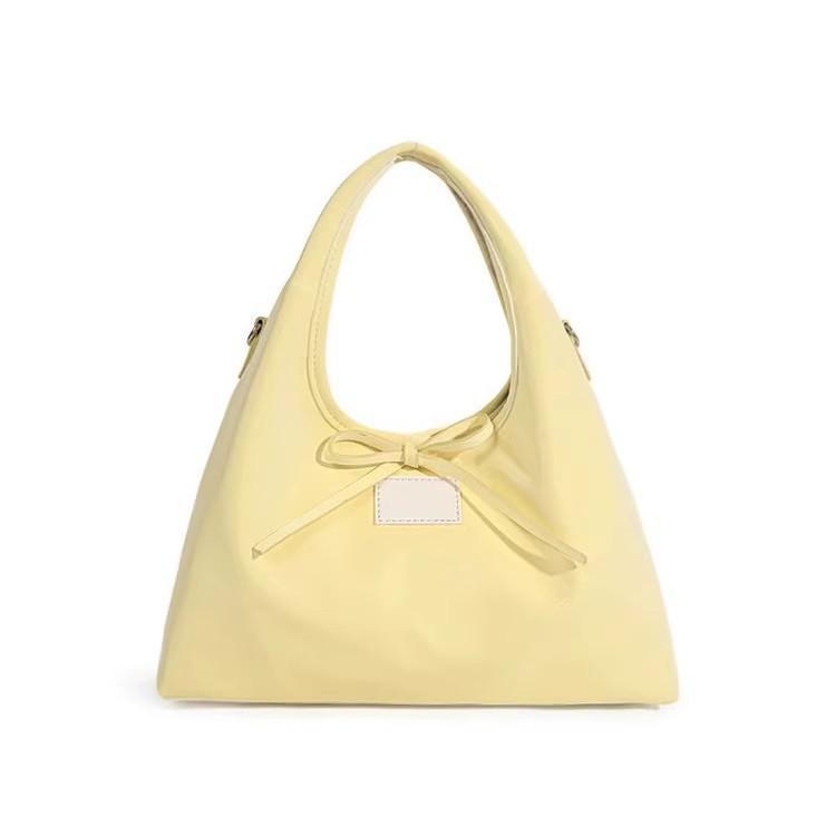Gentle and sweet strap bow handbag spring new simple casual large-capacity dumpling bag