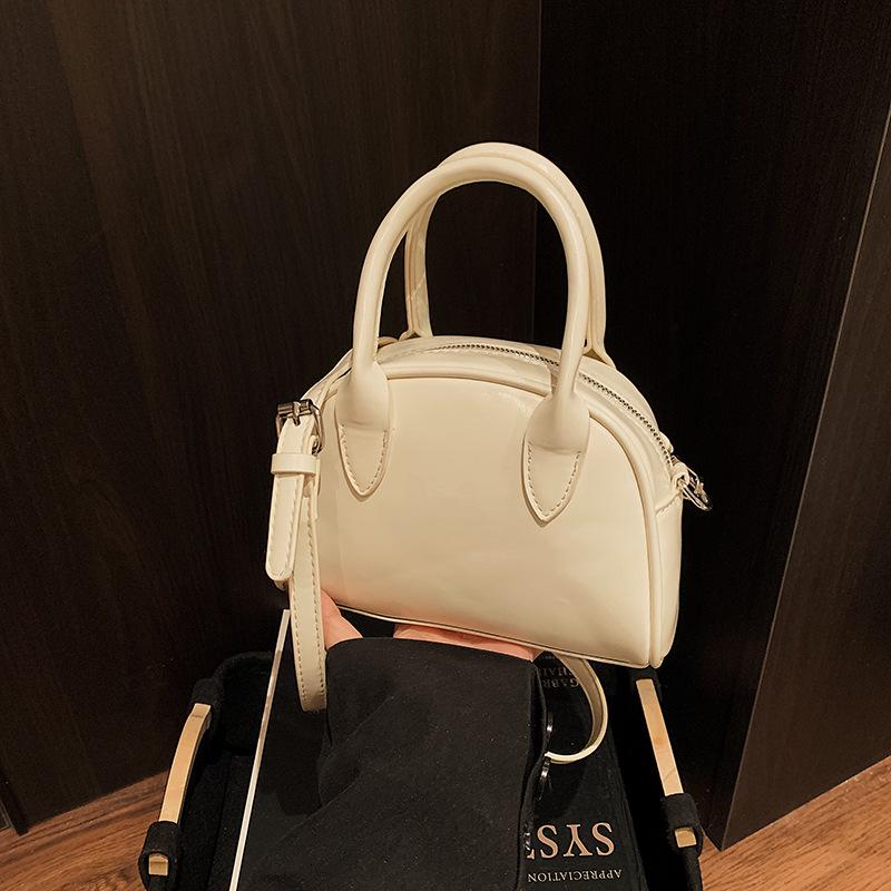 

Small bag women s retro new fashion messenger bag versatile niche portable pillow bag