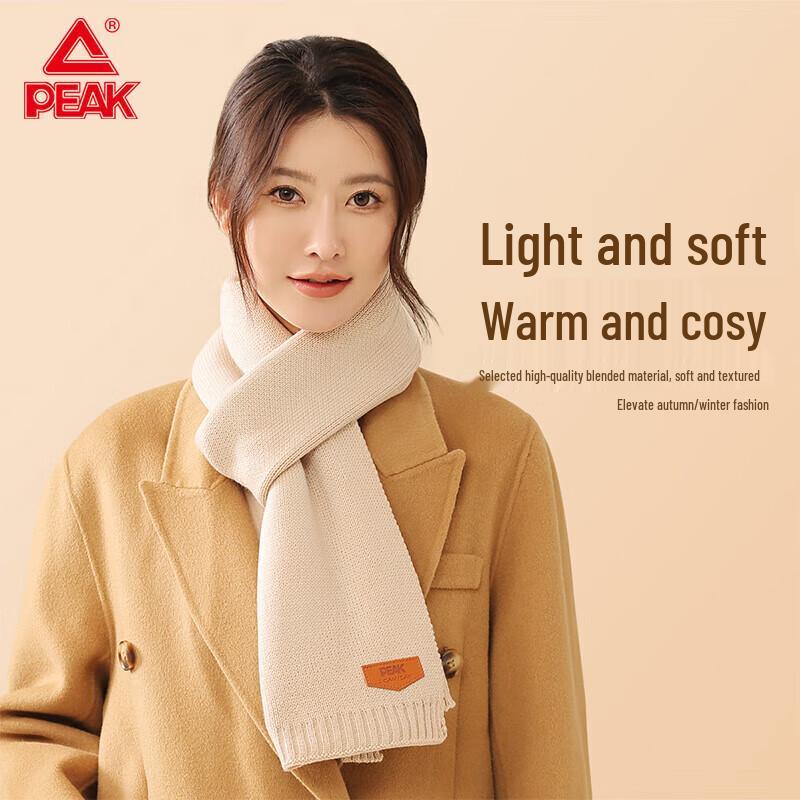 

Вязаный шарф с узором косы