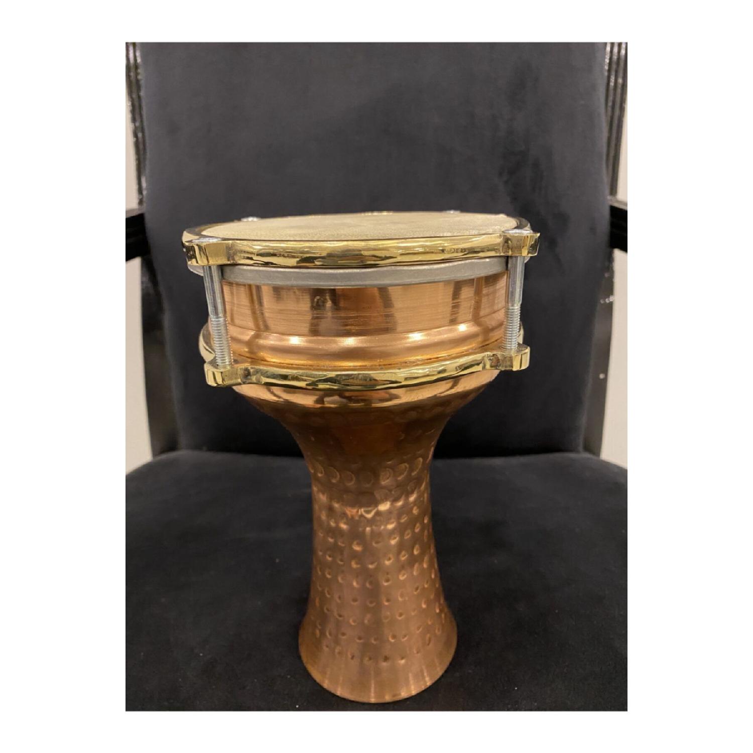 

Tomtom, Doumbek, инкрустированная точками шкура животного, медная дарбука Fiske