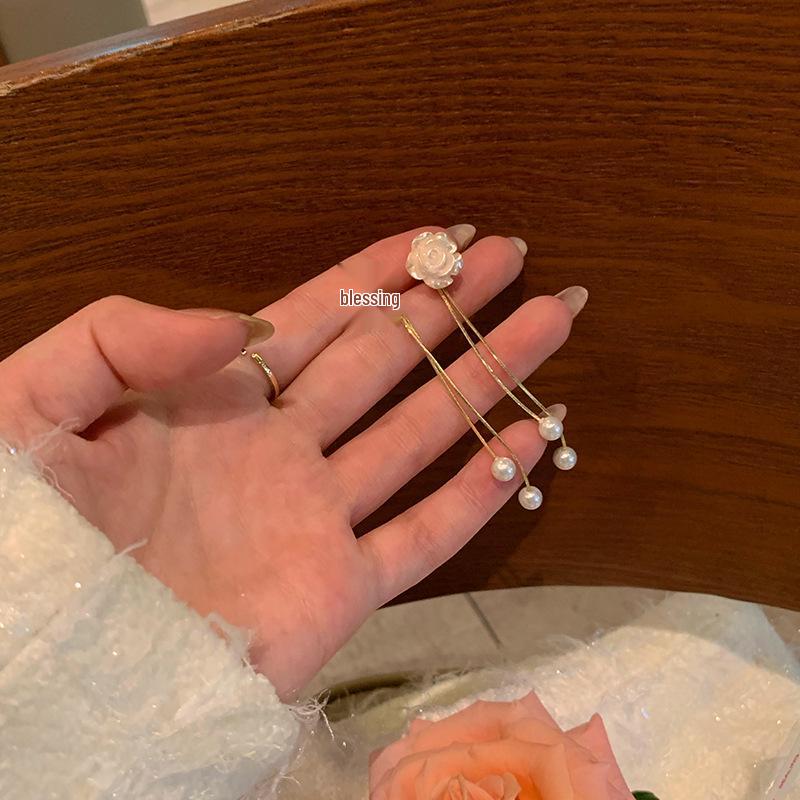 

Camellia Tassel Luxury Stud Earrings for Women - Elegant Design for a Socialite.