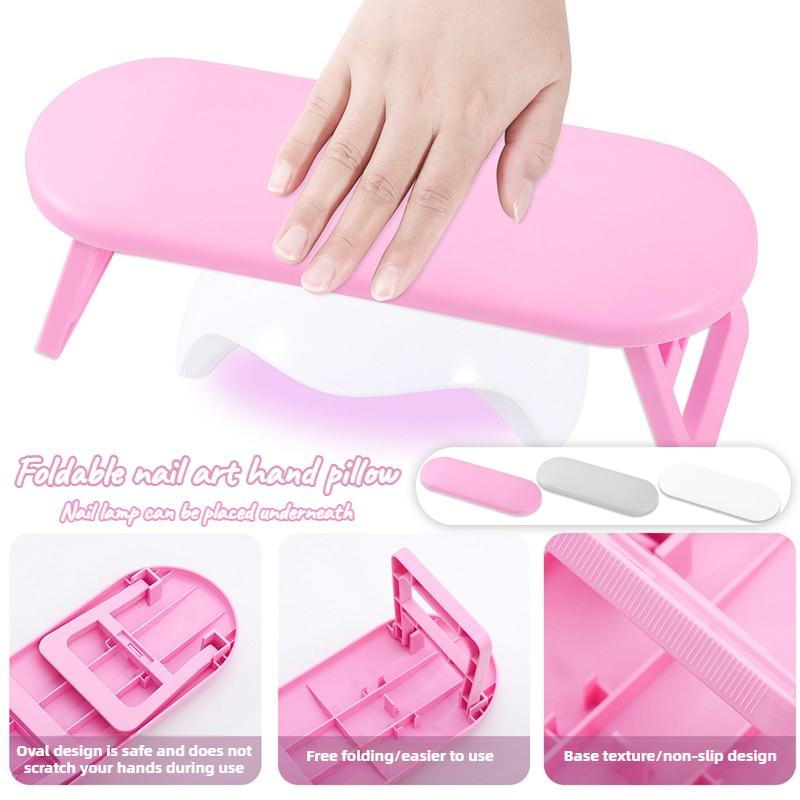 Upgraded plastic nail art hand pillow that can be folded, portable and can hold nail art lamps, multifunctional desktop stand