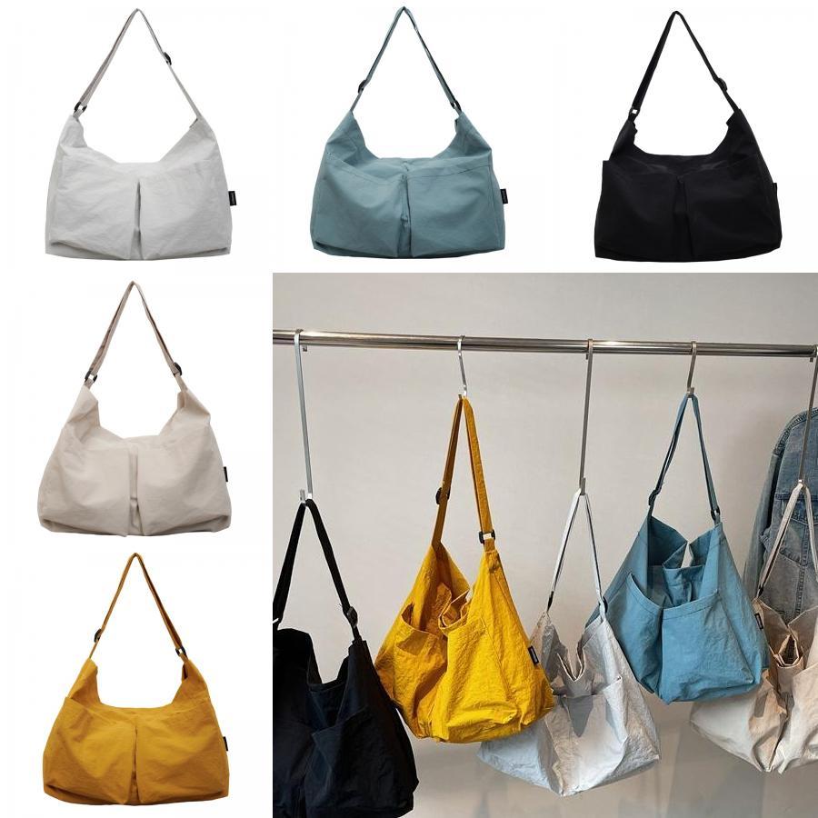 Borsa a tracolla minimalista in tela con chiusura a zip per uso quotidiano casual