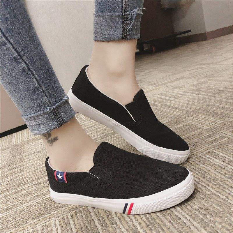 Segeltuchschuhe Frühling flach Ein-Pedal faule Schuhe Board Schuhe Trend