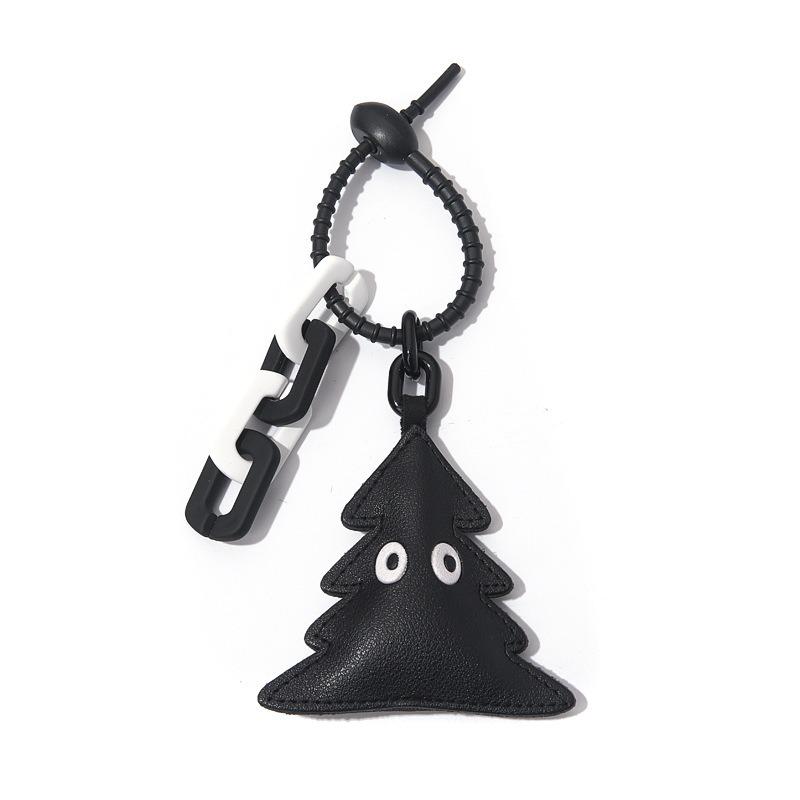 

Premium leather handmade flower eye schoolbag pendant pendant keychain creative car bag accessories