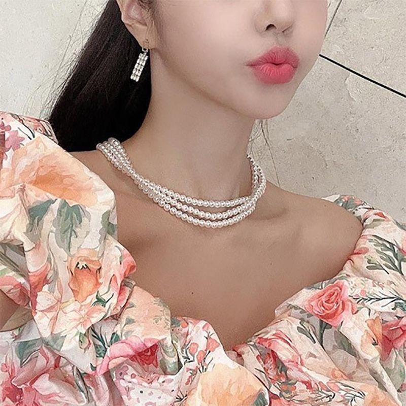 Fashion jewelry, bohemian multi-layer necklace, popular street auction popular pearl necklace.