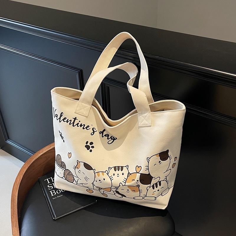 

Cute cartoon canvas bag women s new casual large-capacity versatile shoulder bag commuter tote bag коричневый