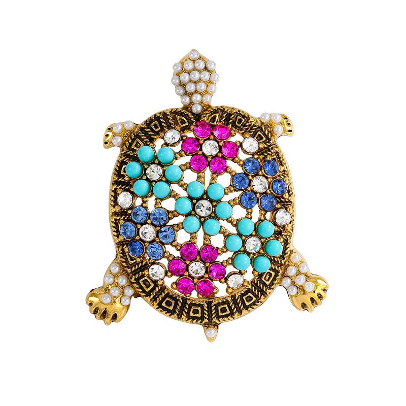 Retro hollowed out turtle brooch, women s fashionable and exquisite temperament, bead turtle brooch, chest flower, accessories
