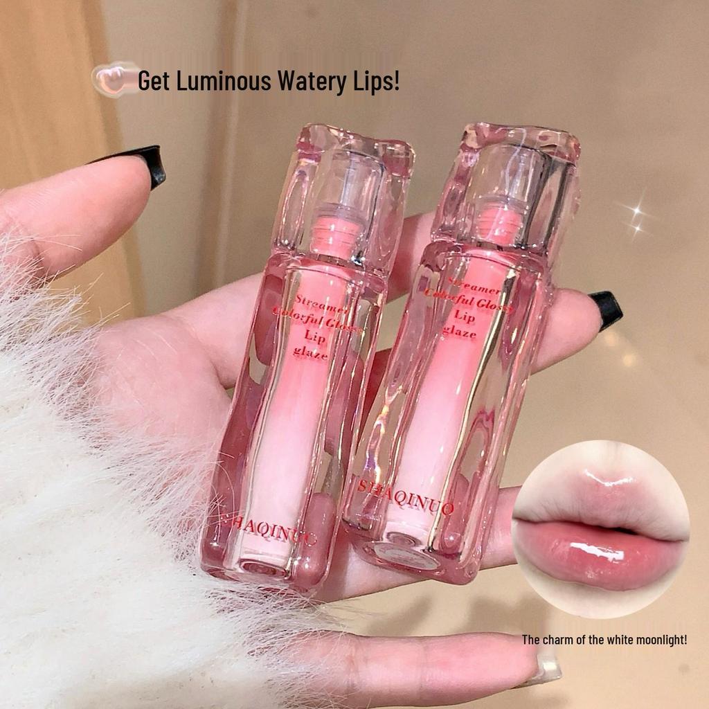 Sakiino Iridescent Lip Gloss: Mirror Finish, Plumping, and Whitening Effect for Glass-Like Lips.