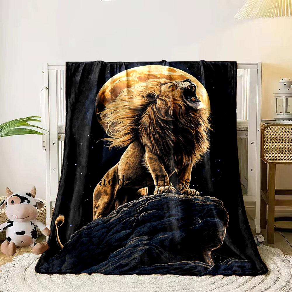 

A roaring lion stands on a rock with a glowing full moon in the background. for all seasons blanket lunch break throw gift 80cm x 120cm
