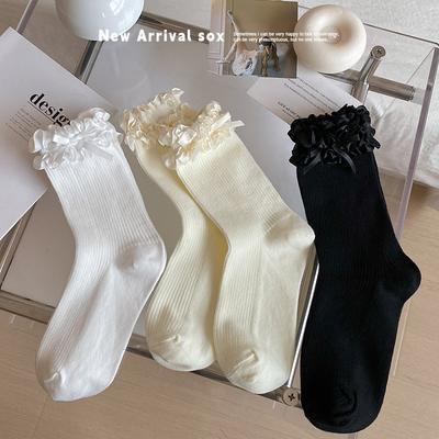 Lolita Spitzensocken mit Schleife Mid-calf sind süß und stilvoll für Frühlings- und Herbstmädchen. Die weißen flauschigen Baumwollsocken sind vielseitig