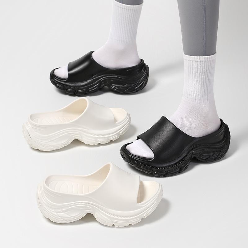 Summer new one-word drag thick-soled high-heeled slippers women's muffin bottom heightening beach shoes wedge heel lazy sandals